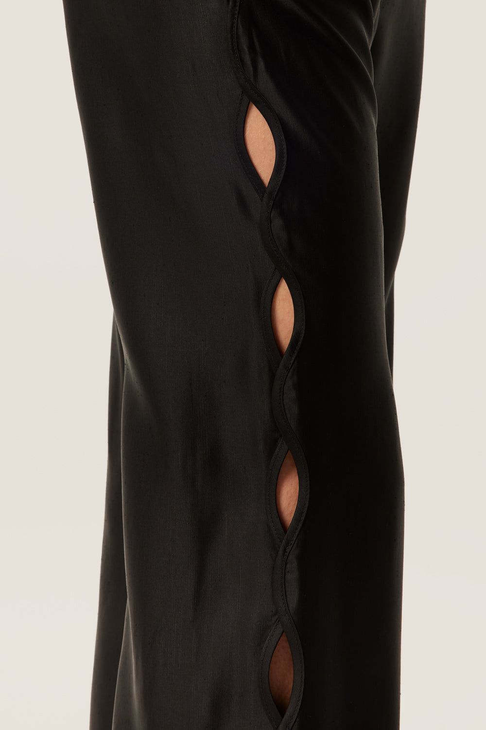 Satin pants with braid opening