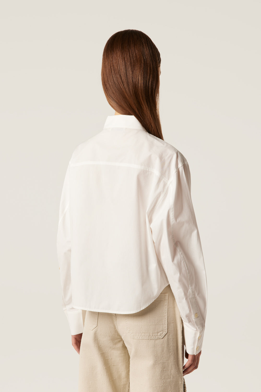 Short shirt with gold embroidery