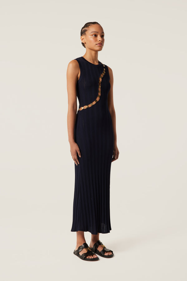 Robe en maille détail dorés