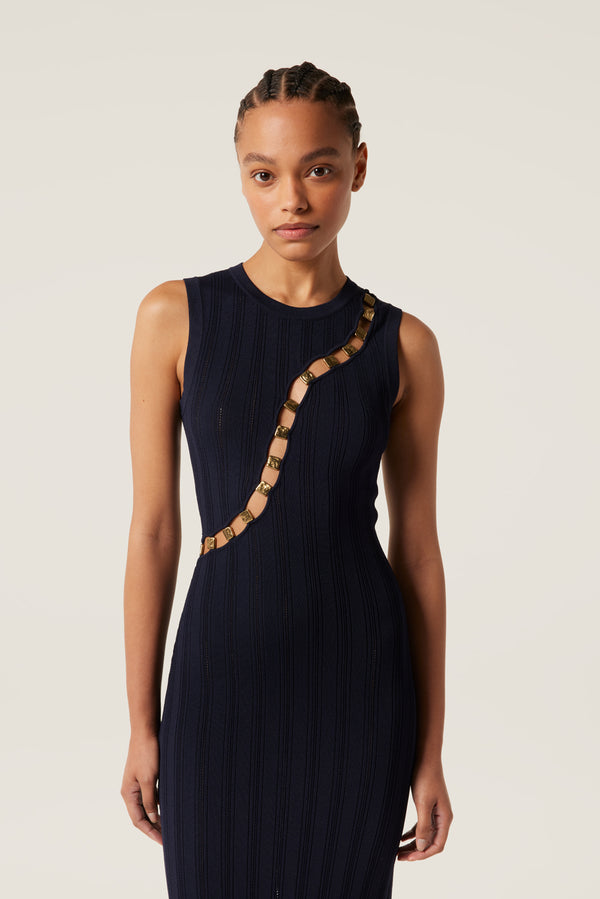 Robe en maille détail dorés