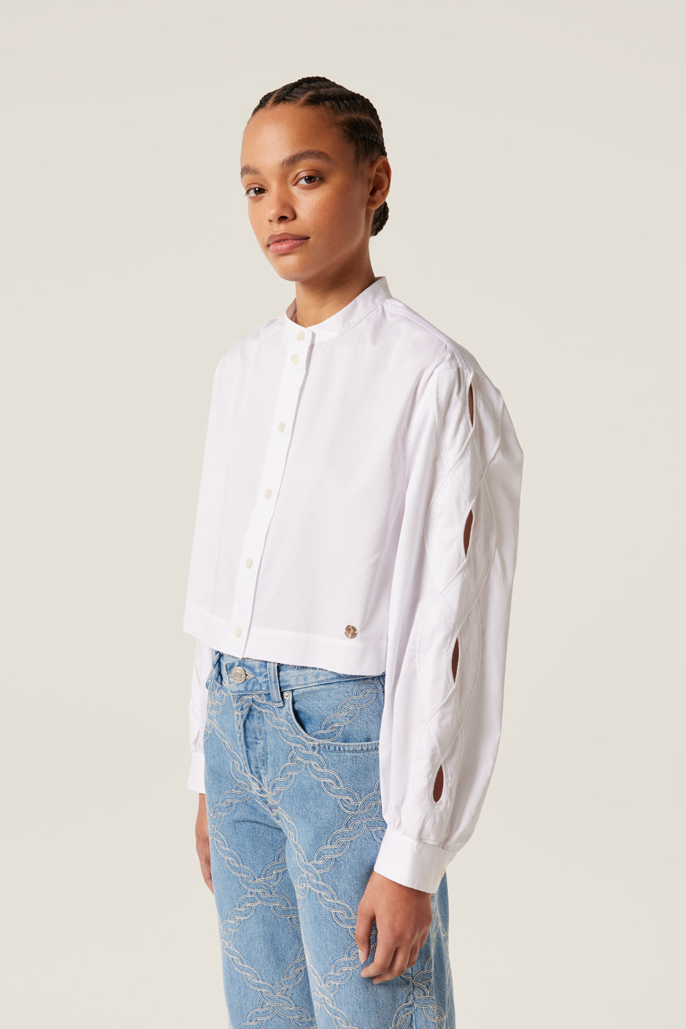 Shirt with braid opening