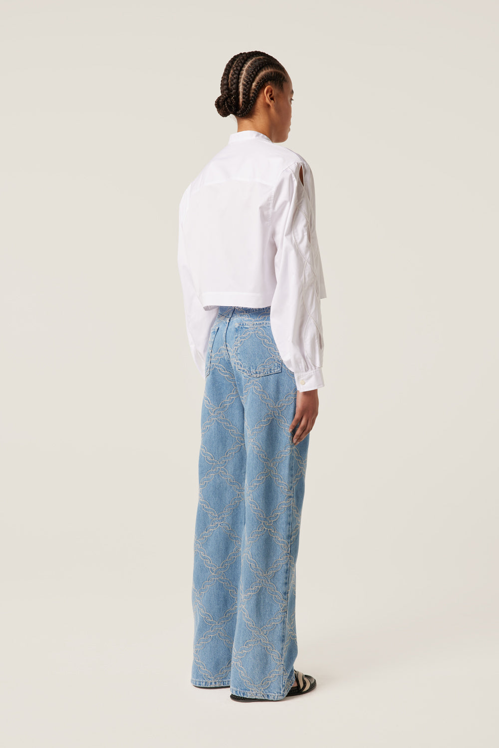 Denim with embroidered braids