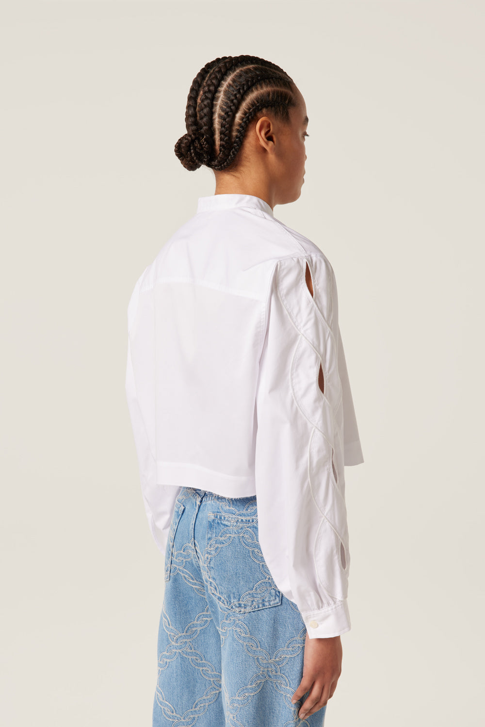 Shirt with braid opening