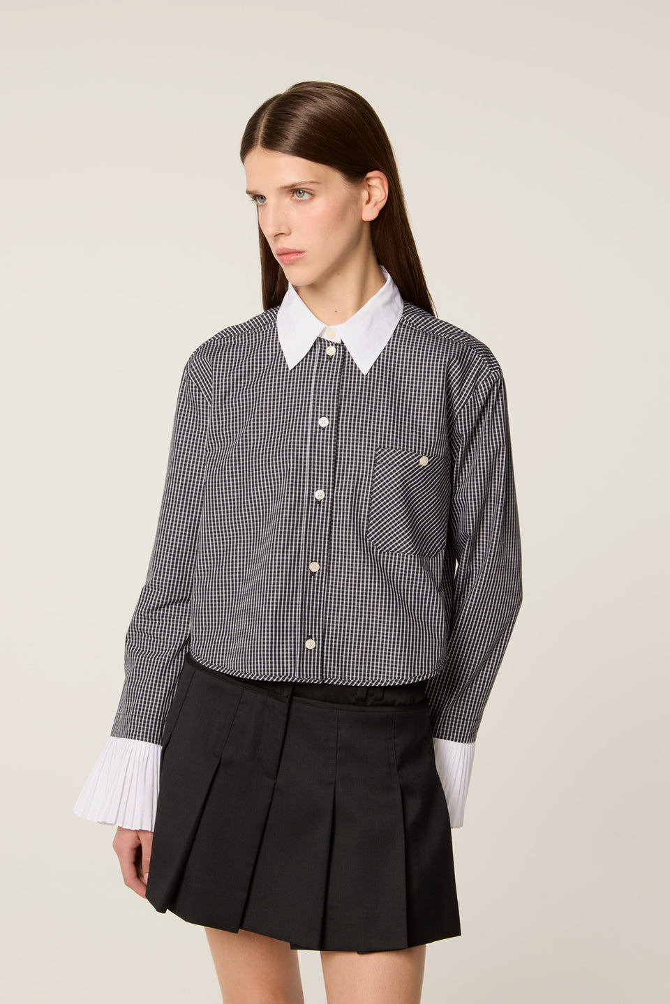 Chemise à poignets plissés