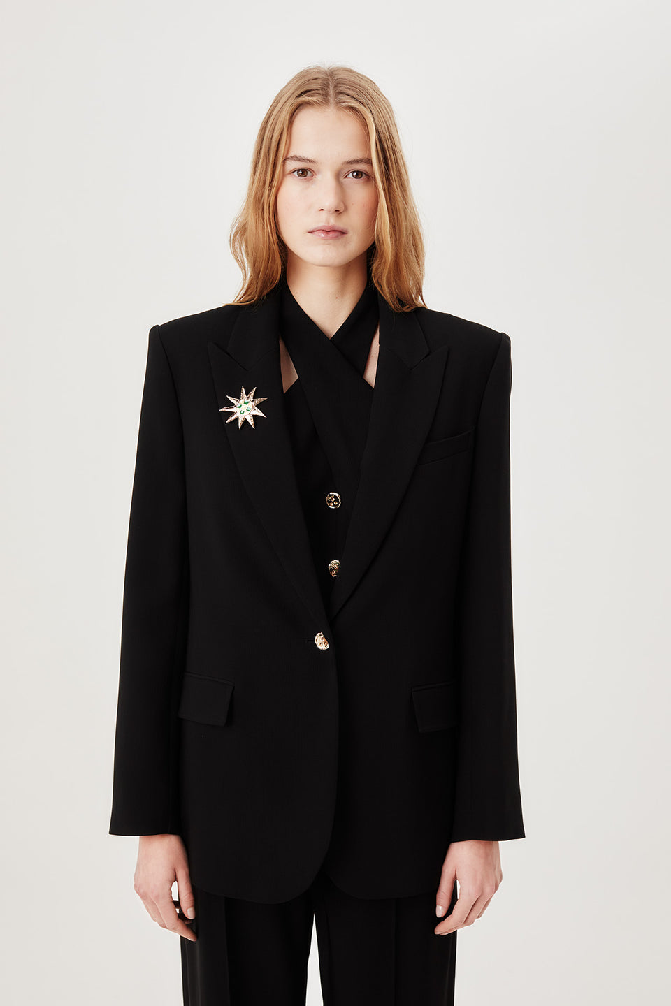 Veste tailleur à broche soleil