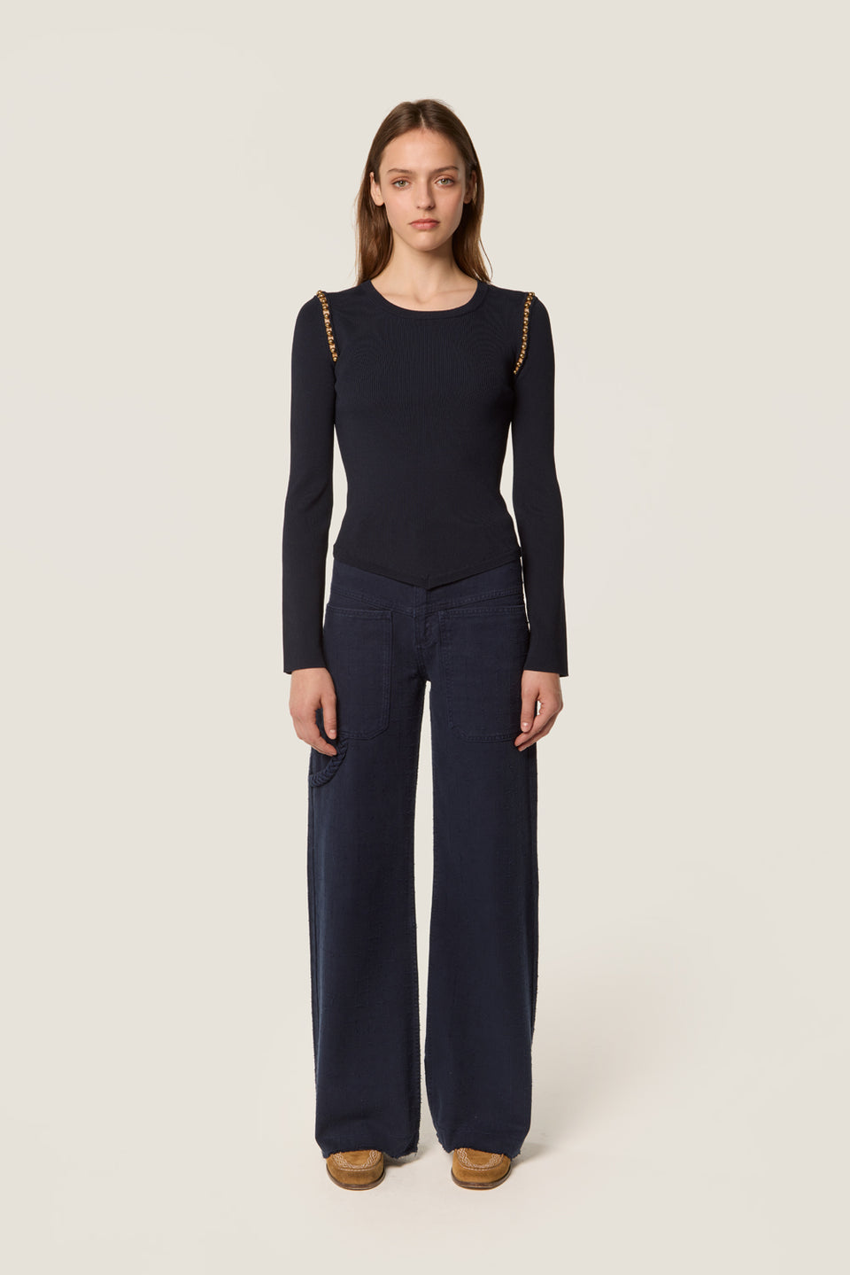 Pull avec billes dorées