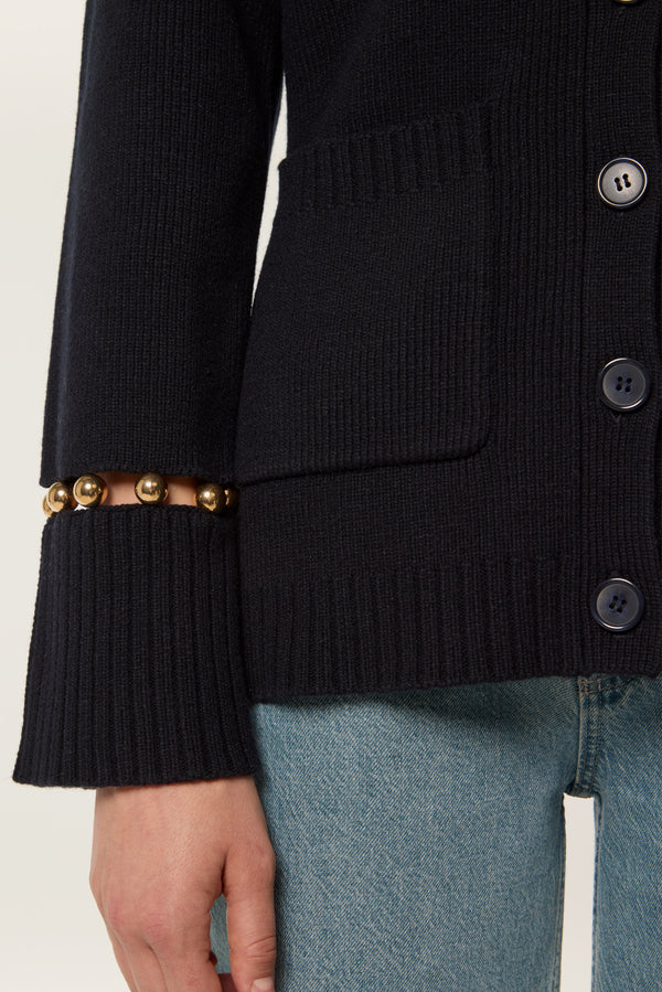 Cardigan à billes dorées