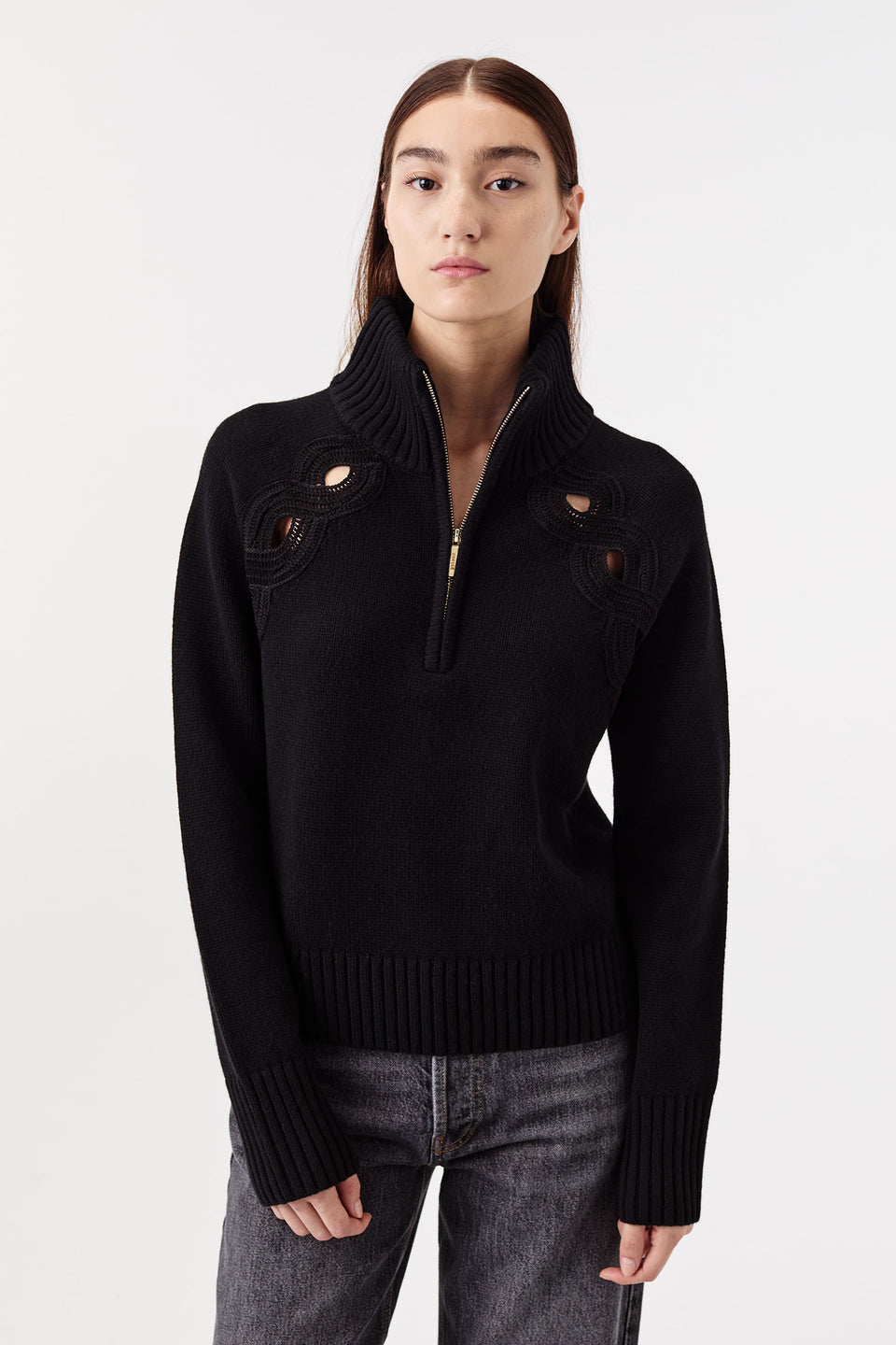 Sweater with braided opening
