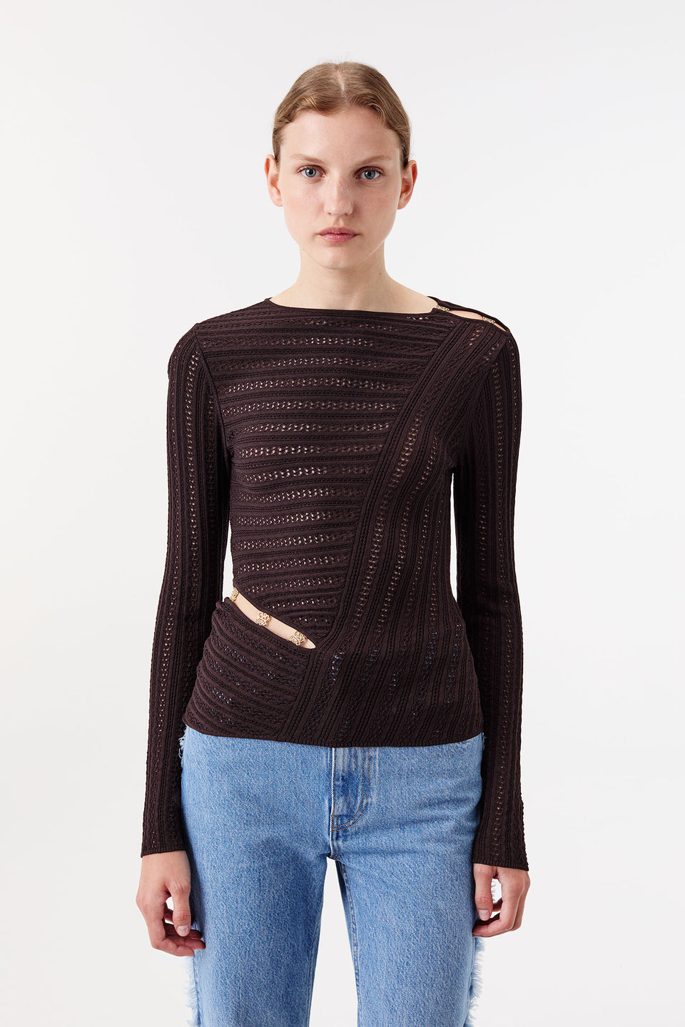 Knit top with asymmetrical cutouts