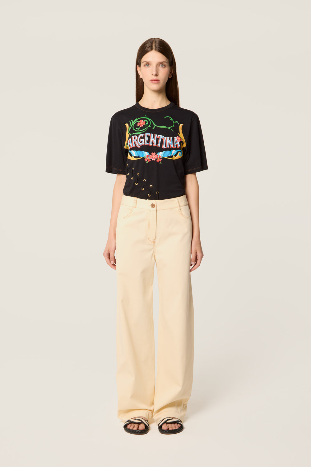 Ecru pants with buttoned belt