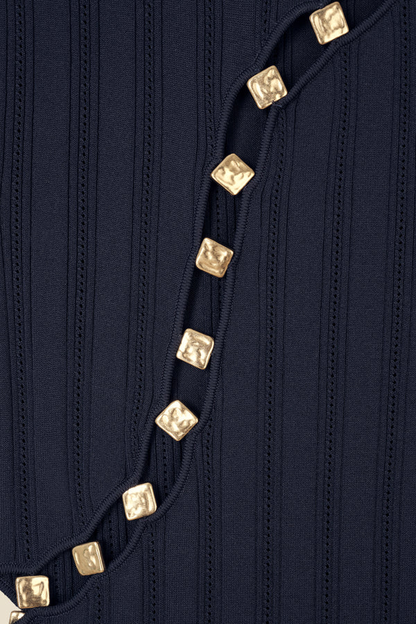 Robe en maille détail dorés