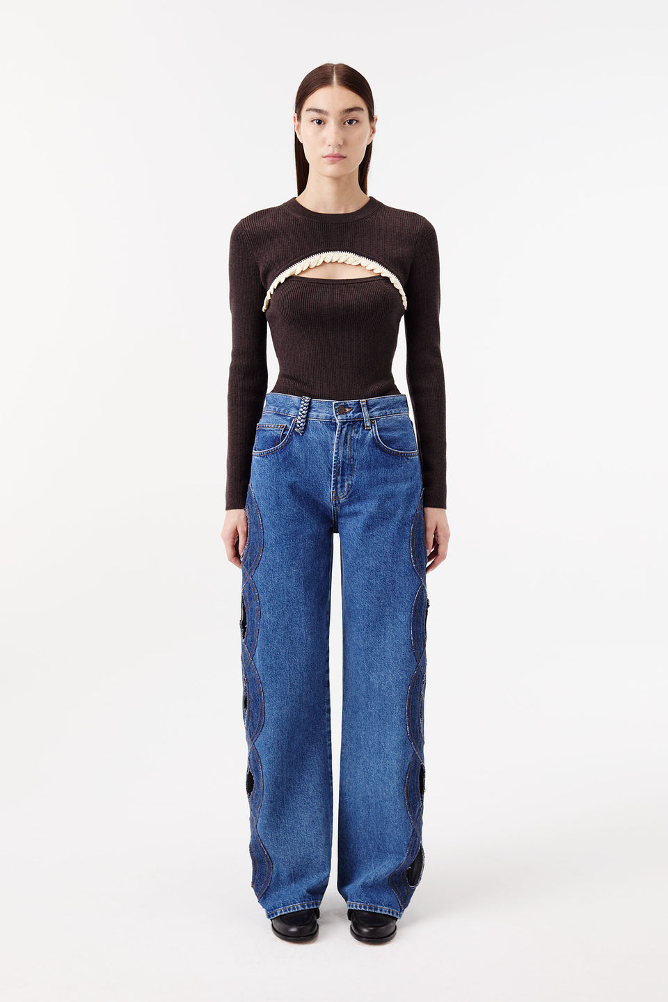 Denim jeans with braided opening