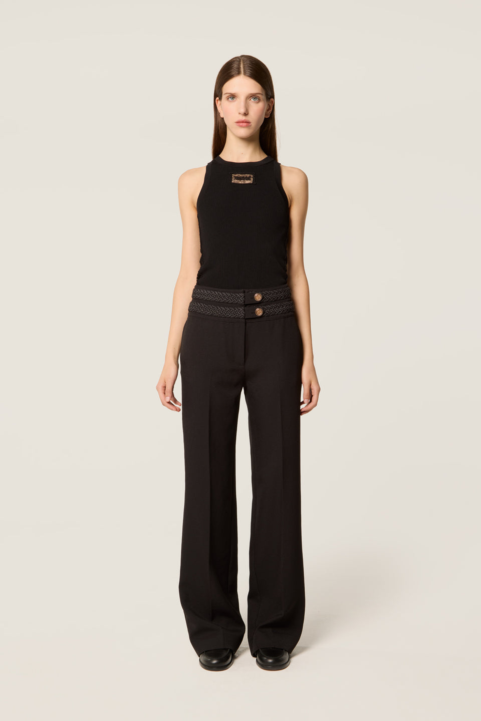 Pantalon avec ceinture tresse