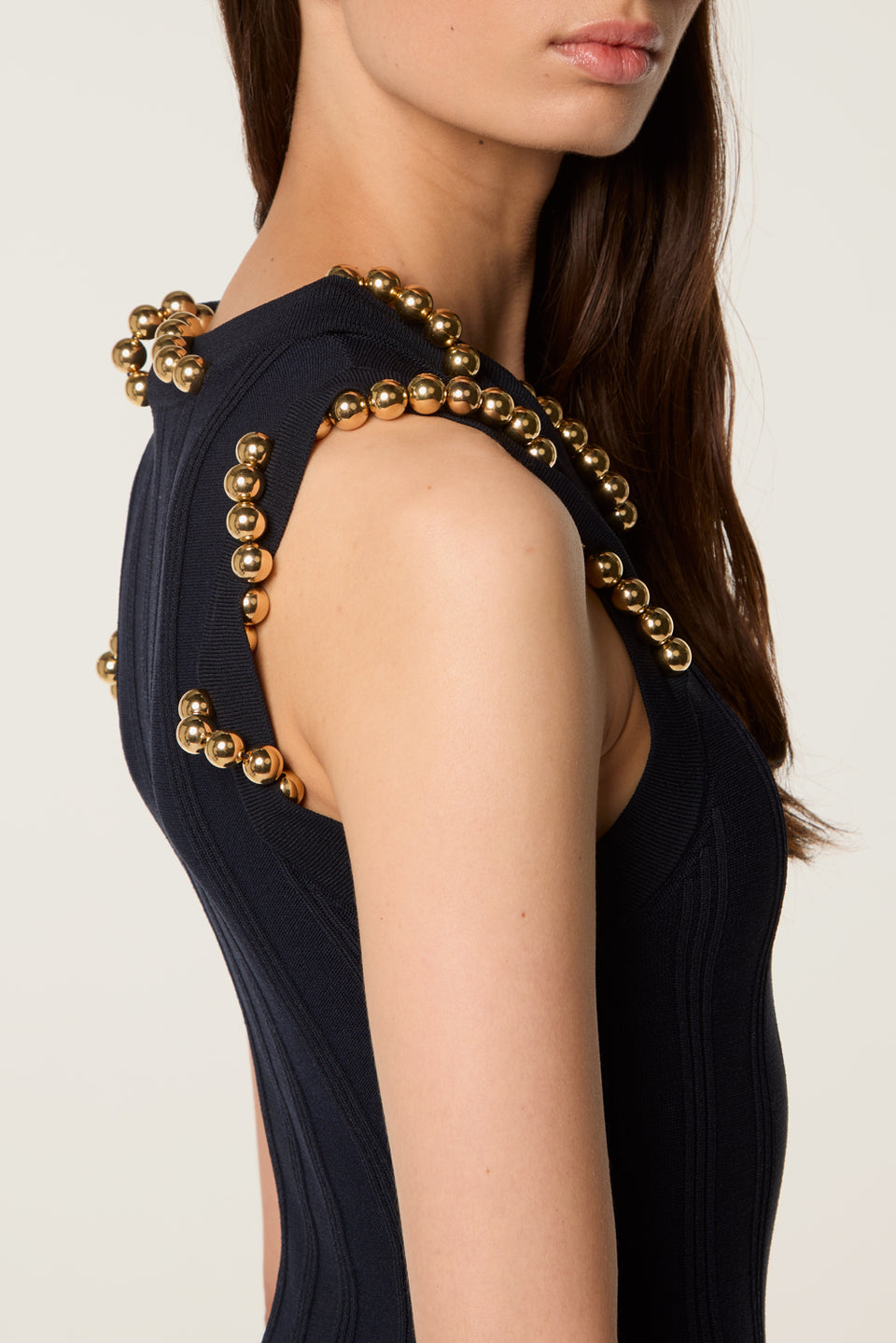 Robe en maille avec billes dorées