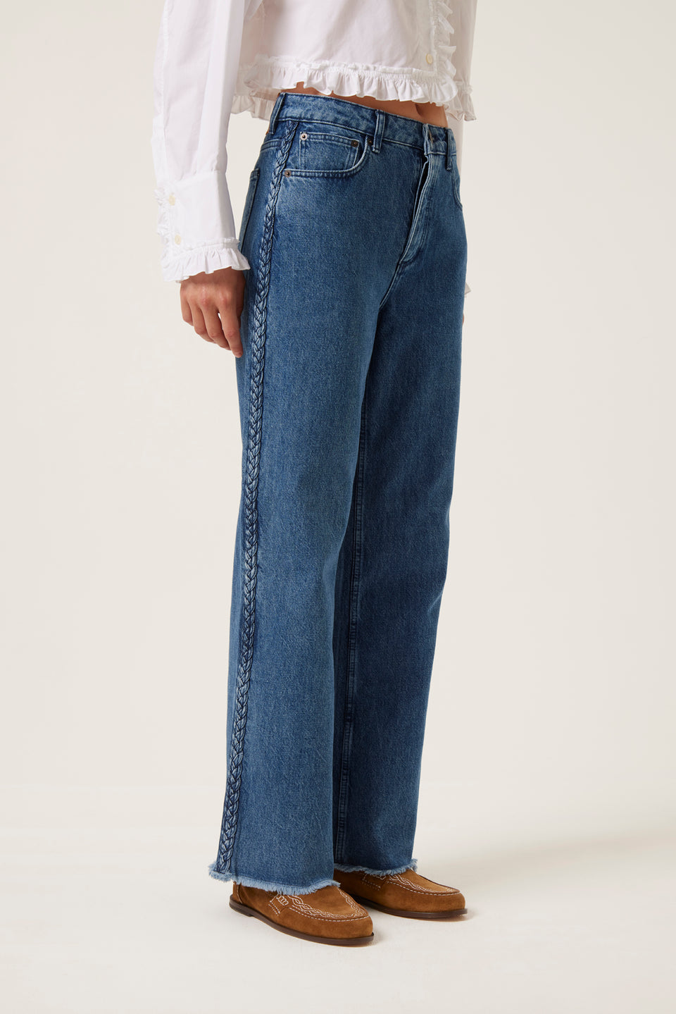 Denim with applied braids