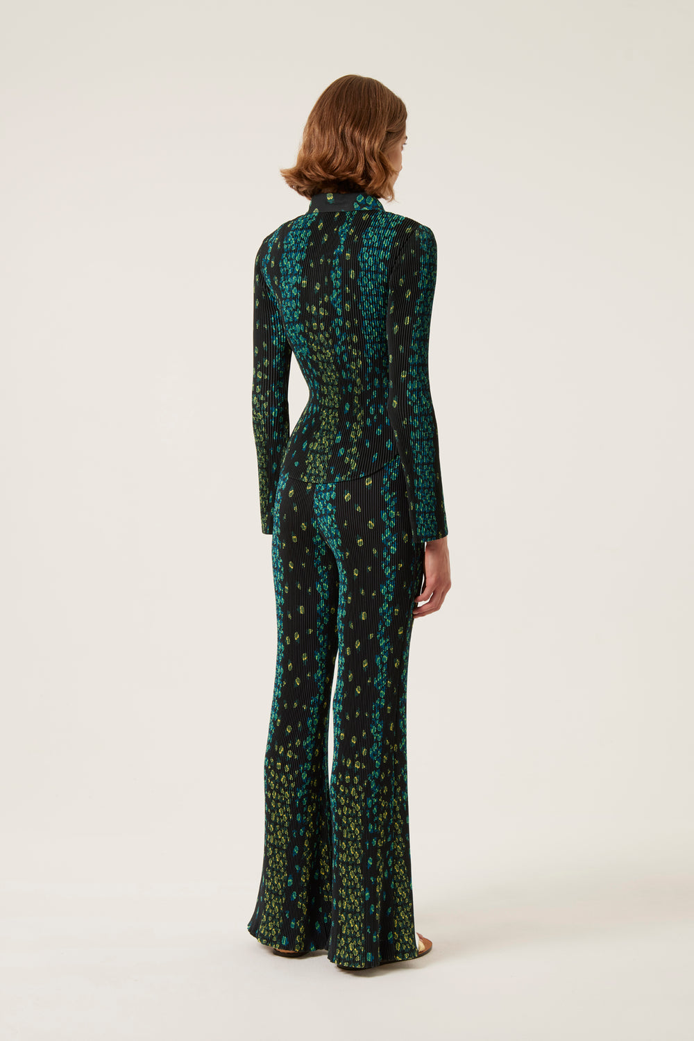 Pleated flowing pants with floral pattern