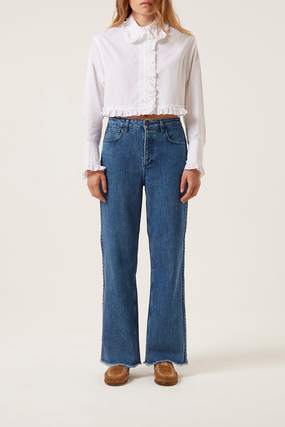 Denim with applied braids