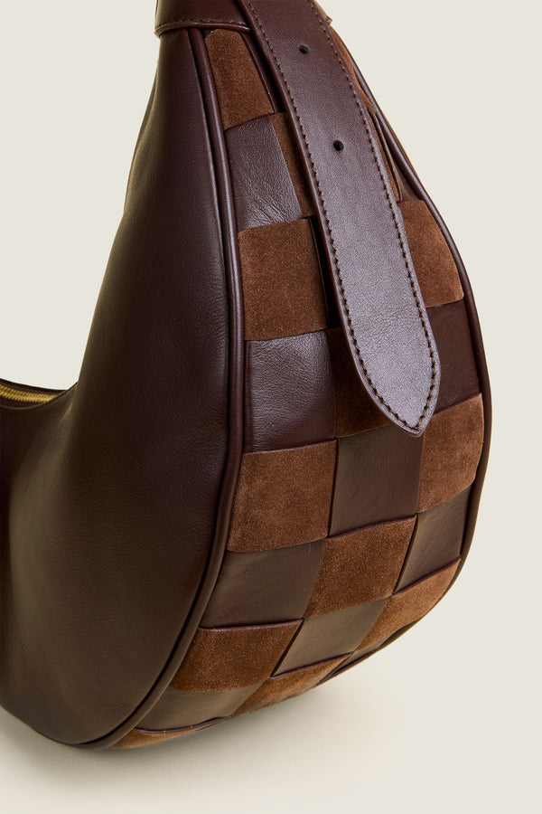 Two-material checkerboard pattern shoulder bag
