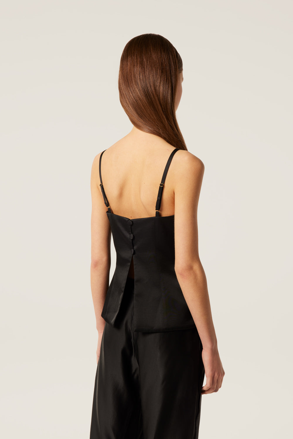 Satin top with gold-tone charms