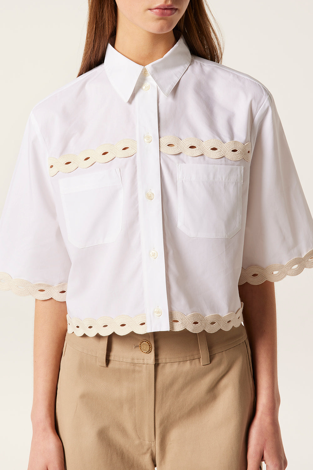 Short shirt with braids