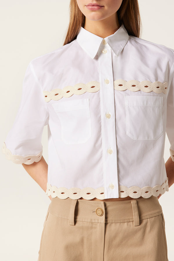 Short shirt with braids