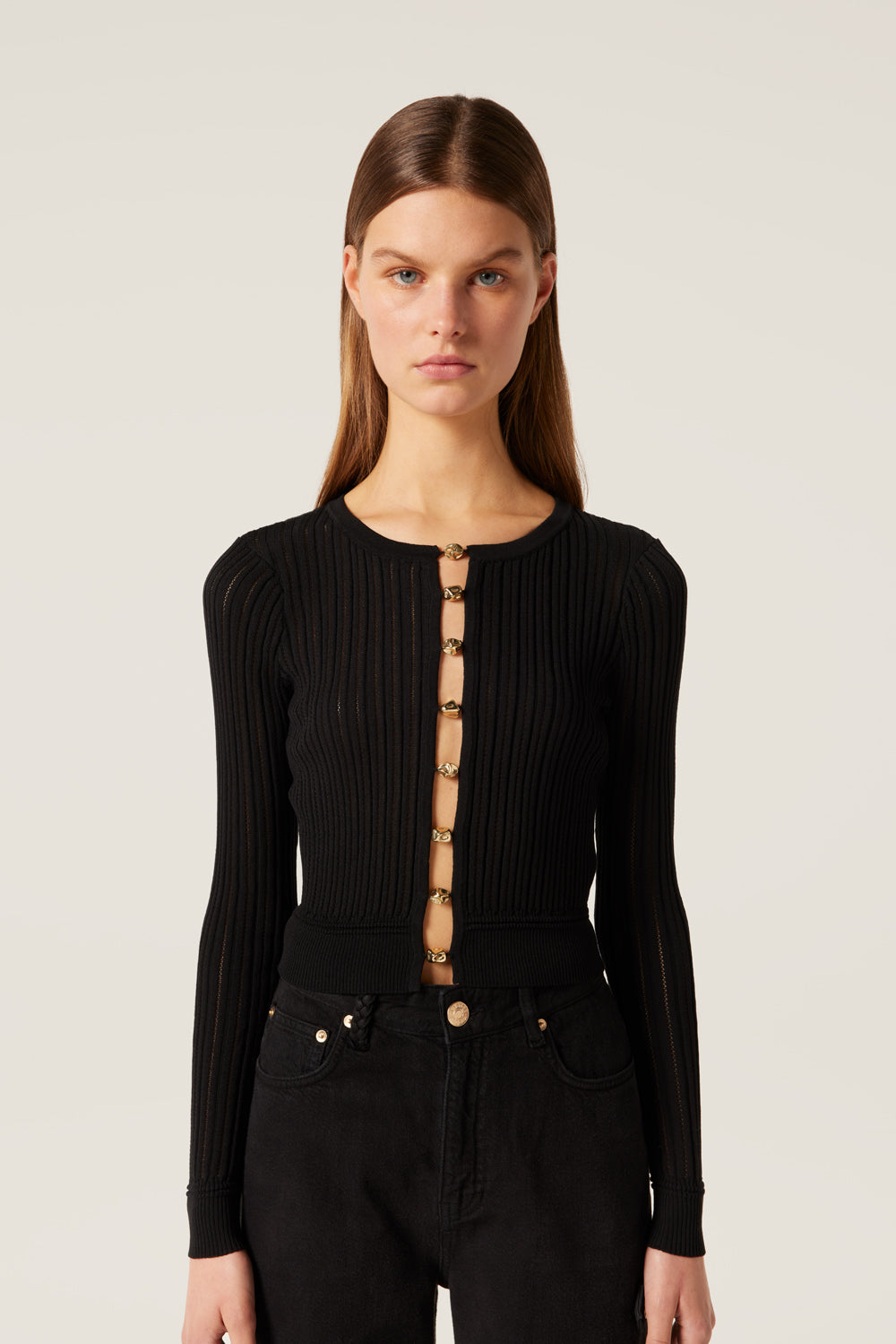 Top en maille à perles dorées