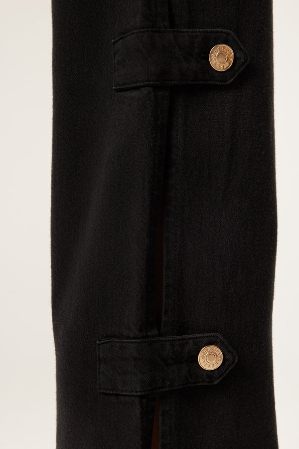 Pantalon à pattes boutonnées