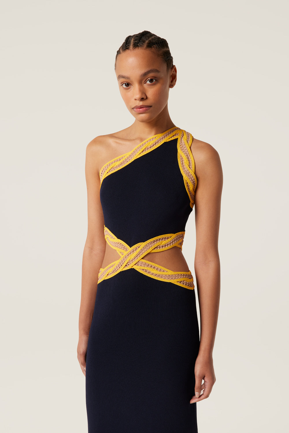 Knit dress with crocheted braid