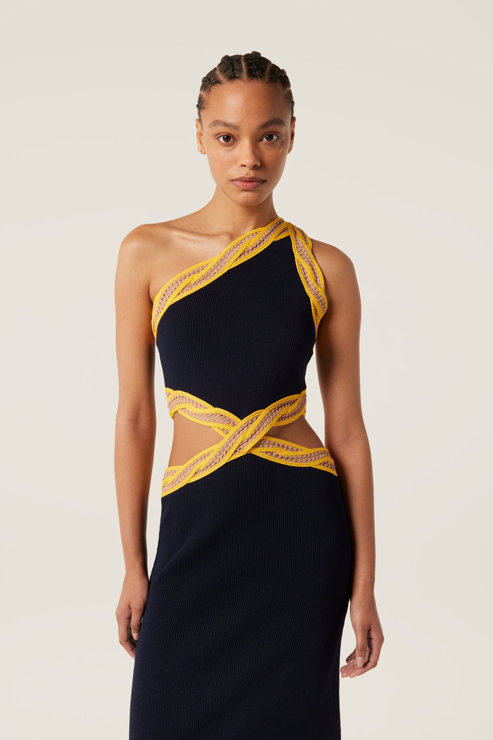 Knit dress with crocheted braid