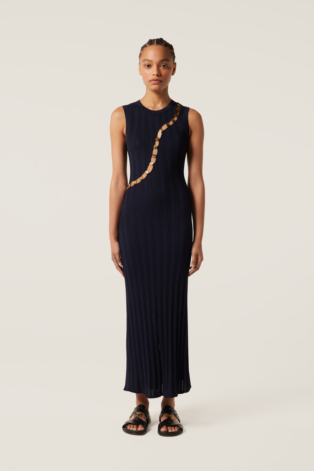 Robe en maille détail dorés