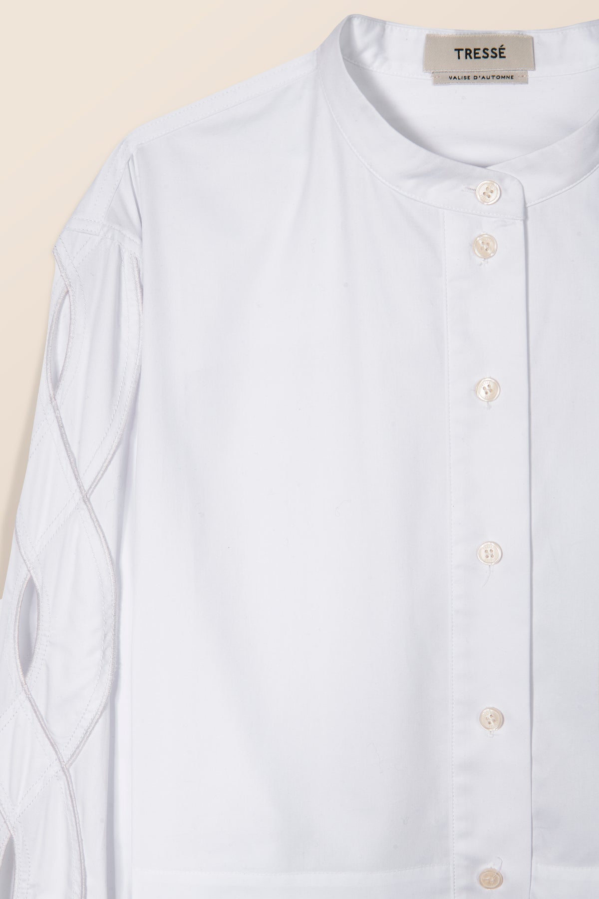 Shirt with braided opening