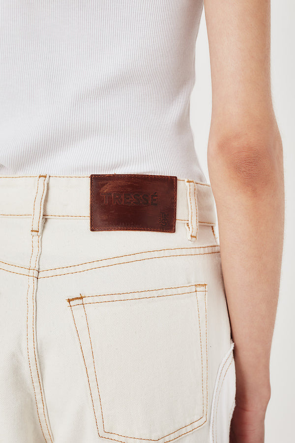 Denim with ecru braid opening