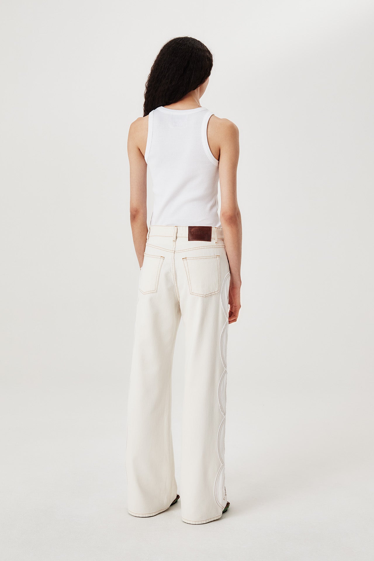 Denim with ecru braid opening