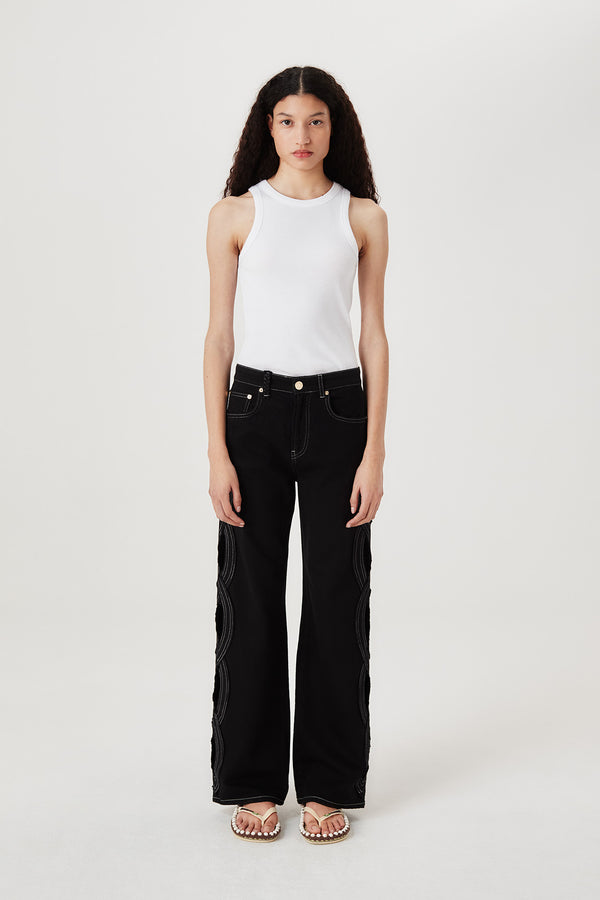 Denim à ouverture tresse