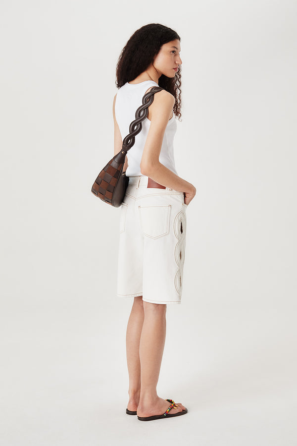 Two-material checkerboard pattern shoulder bag