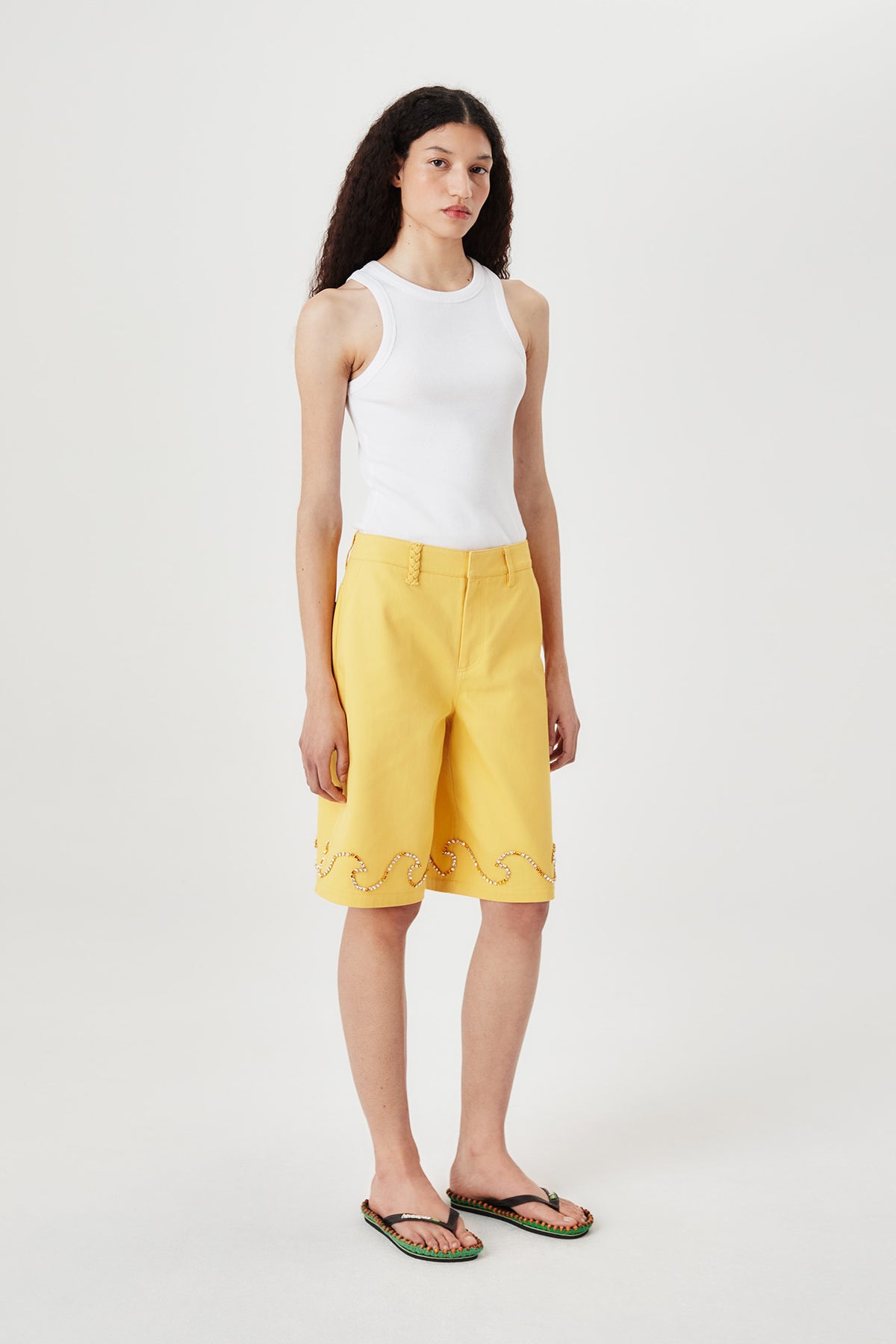 Bermuda shorts with rhinestone wave motif