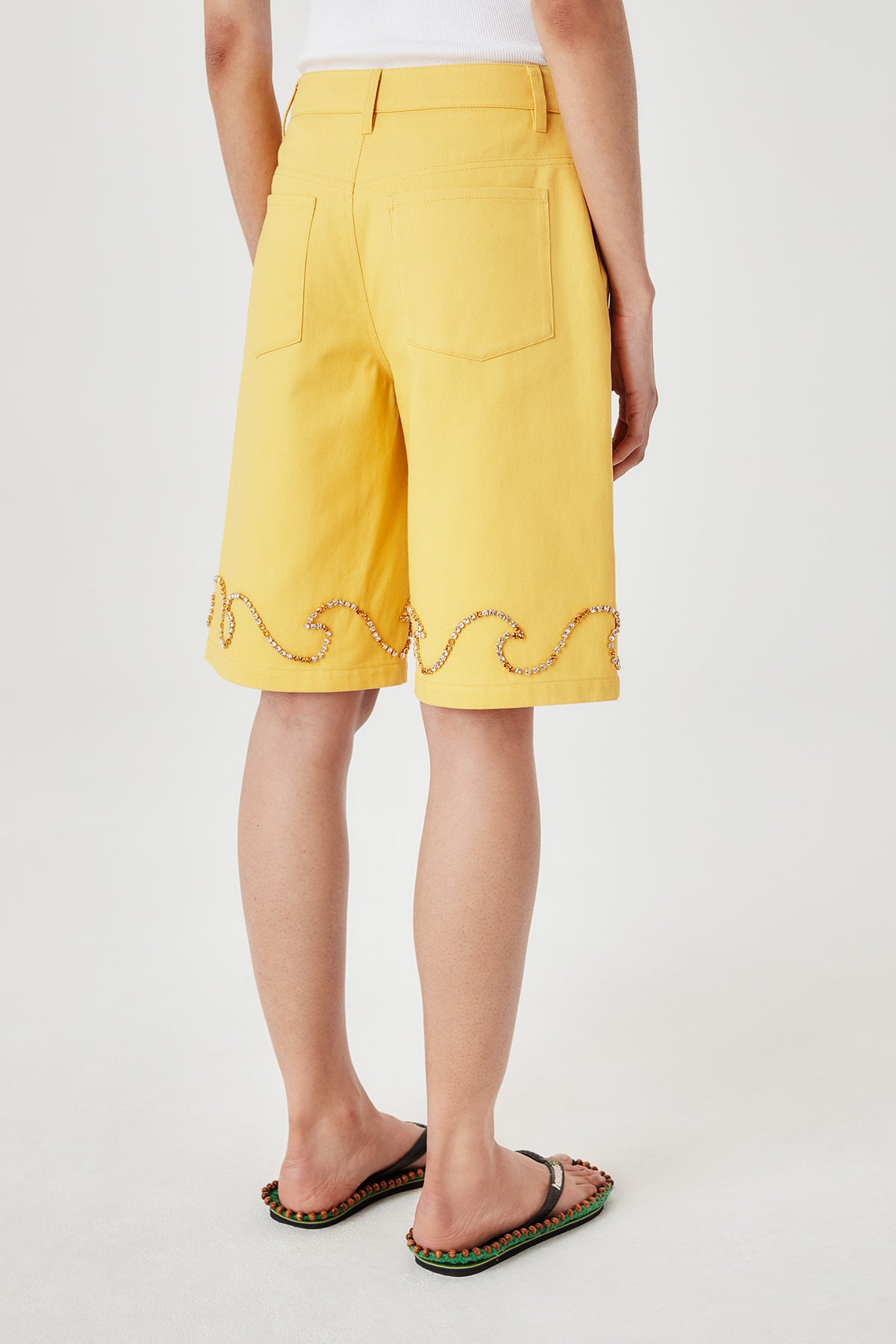 Bermuda shorts with rhinestone wave motif