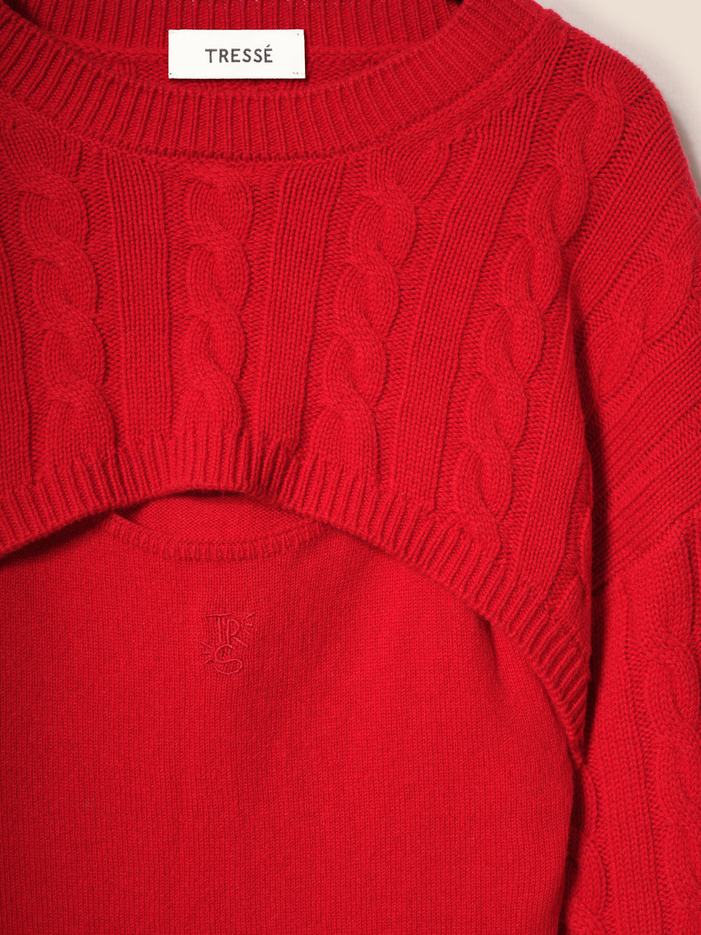 Red cable knit wool sweater