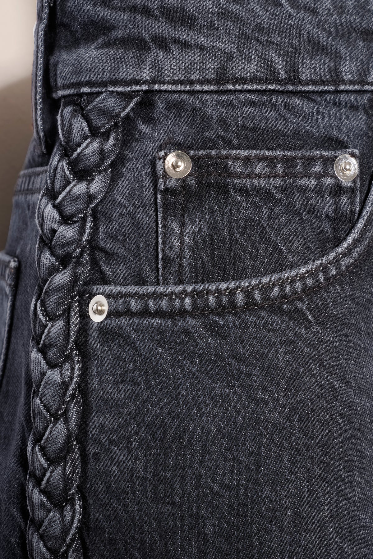 Denim with applied braids