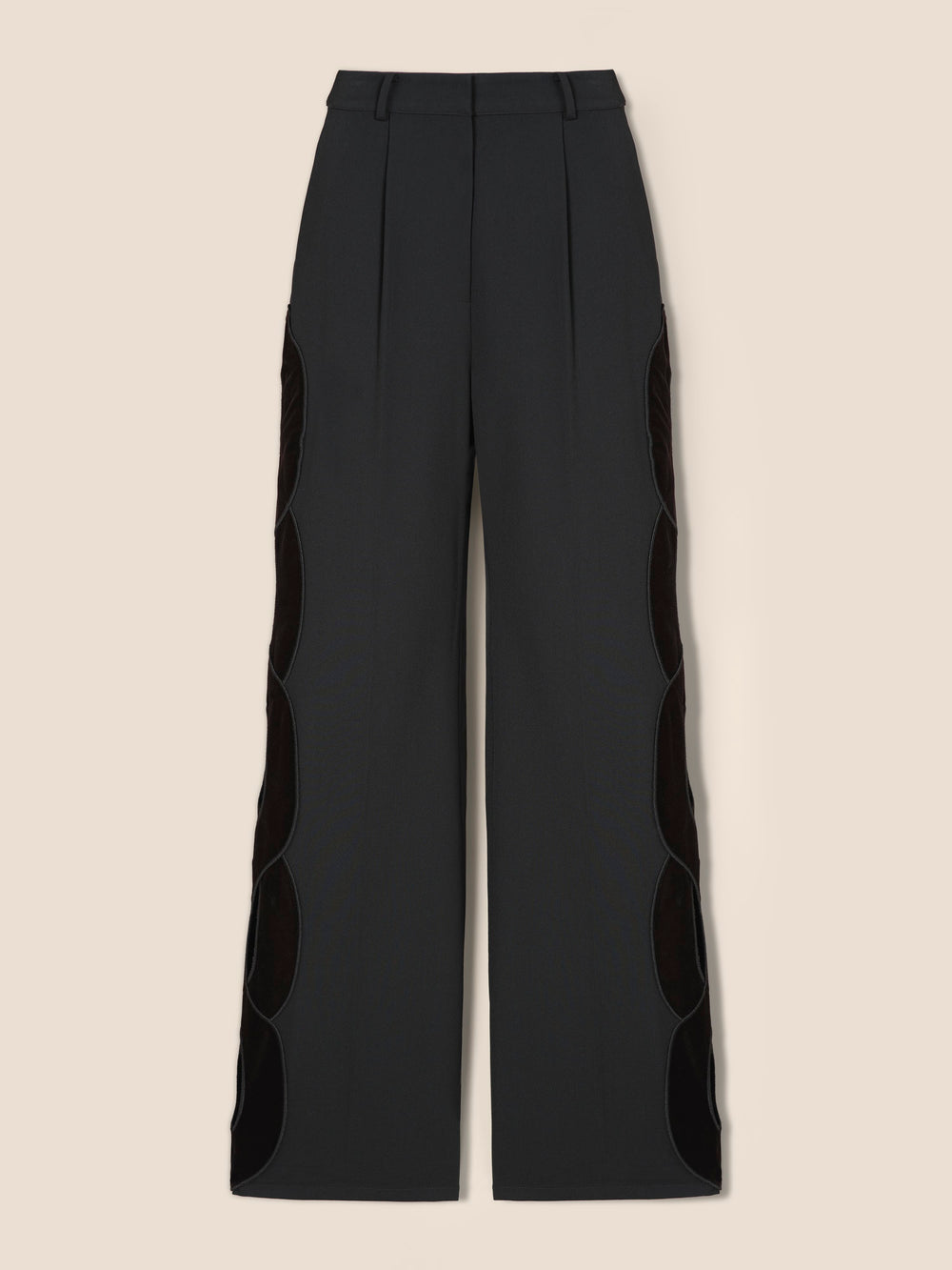 Pantalon avec ouverture tresse