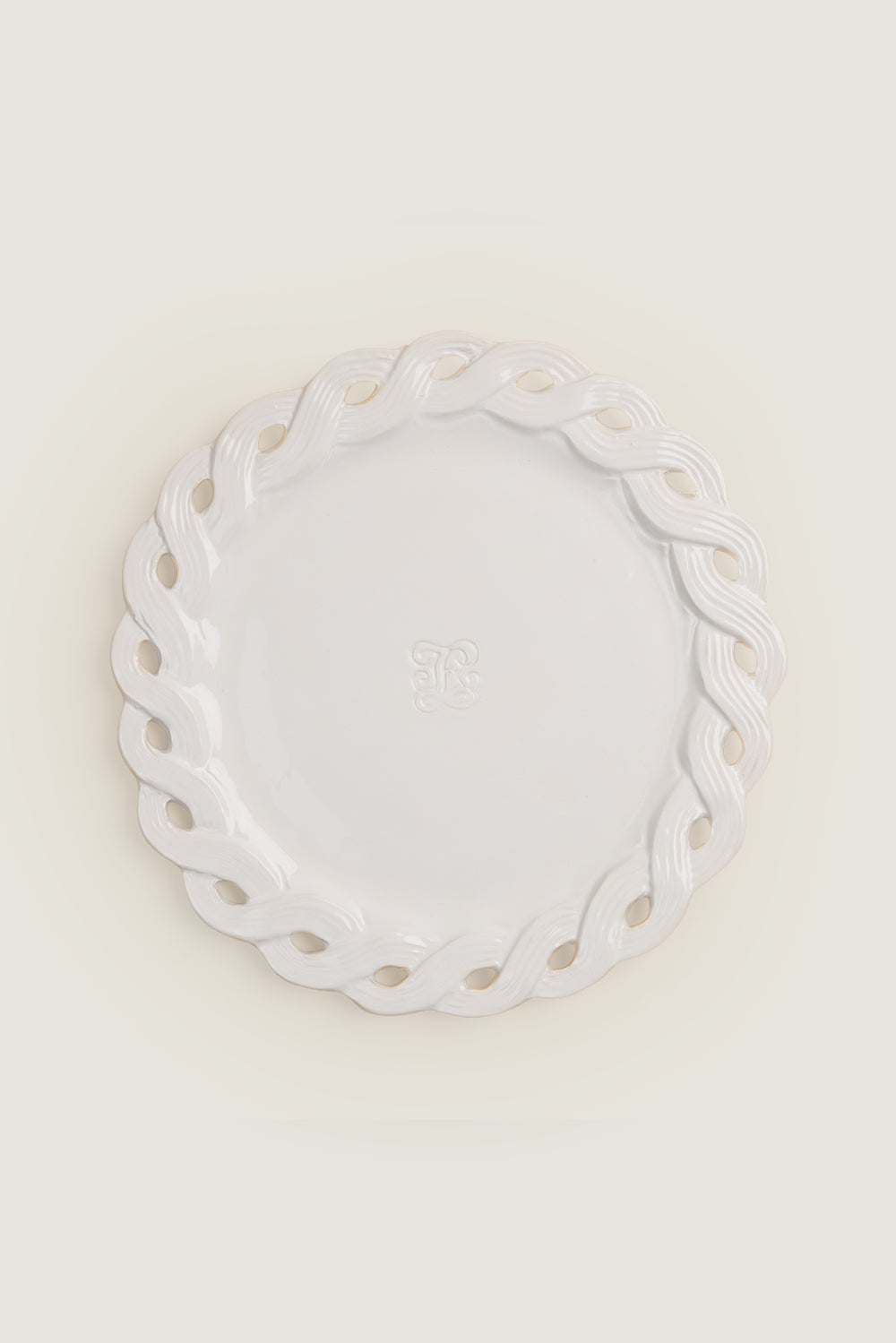 Dinner plate with braided edges