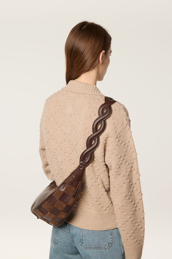 Two-material checkerboard pattern shoulder bag