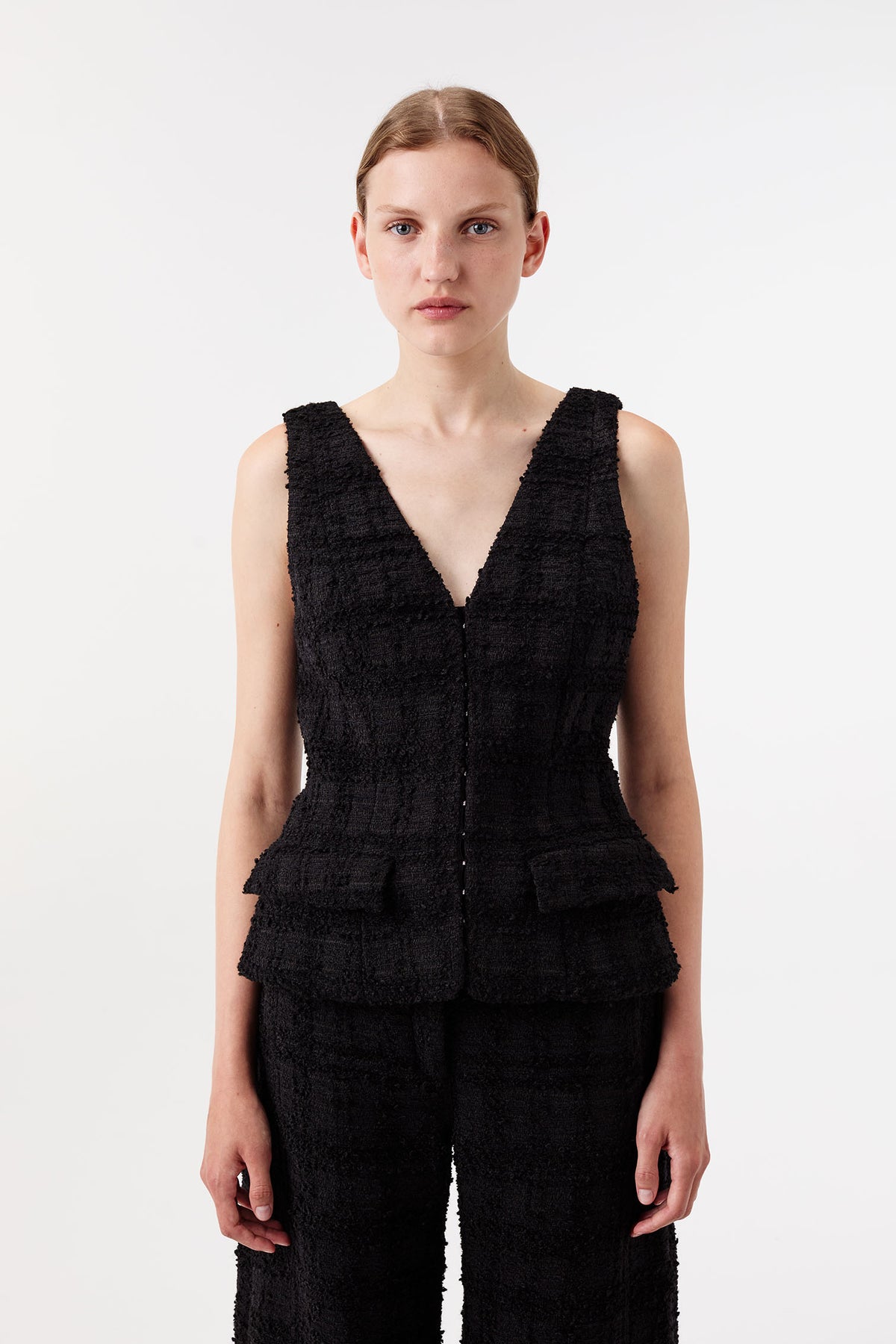 Tweed top with gold brooch