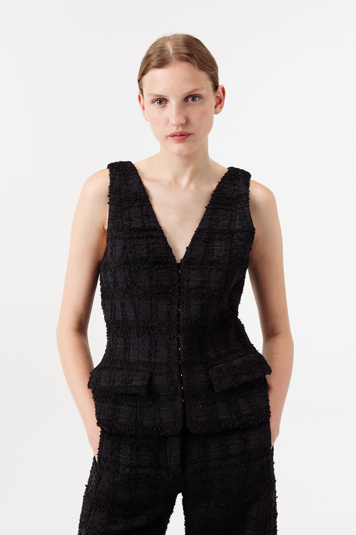 Tweed top with gold brooch