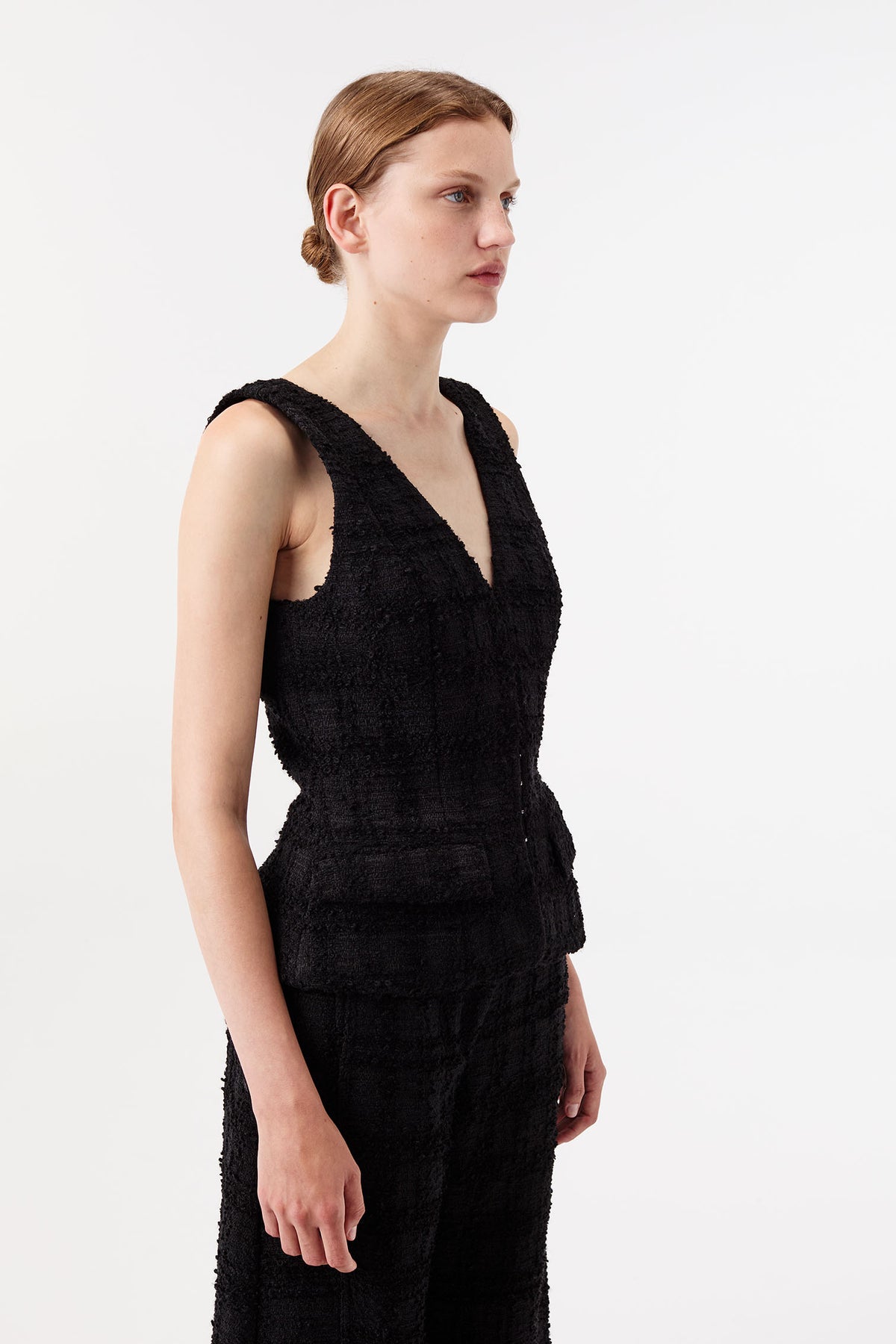 Tweed top with gold brooch