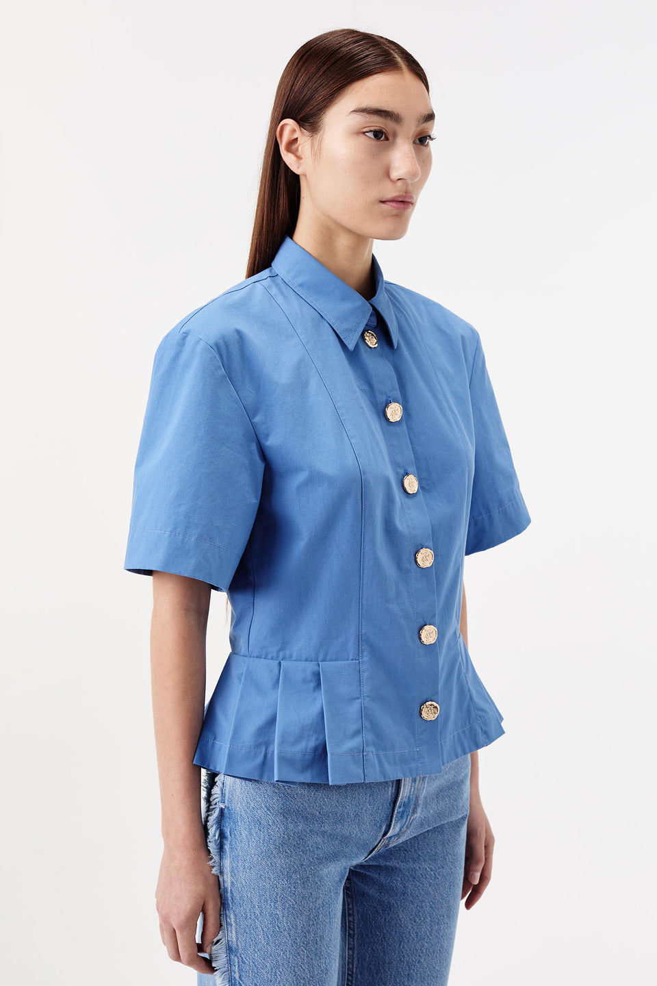 Chemise courte à dos nu