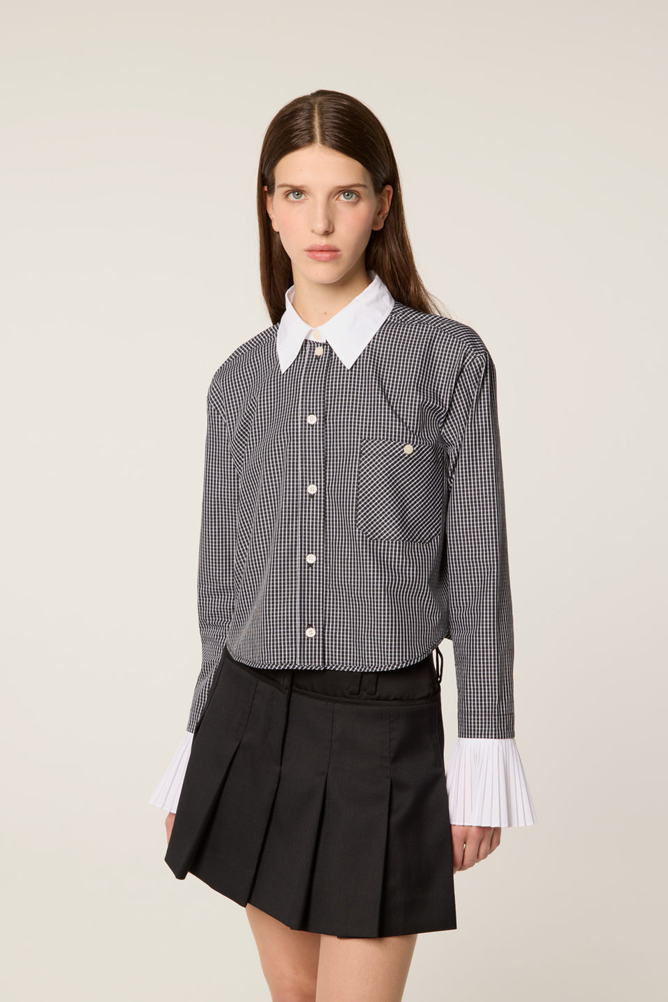 Chemise à poignets plissés
