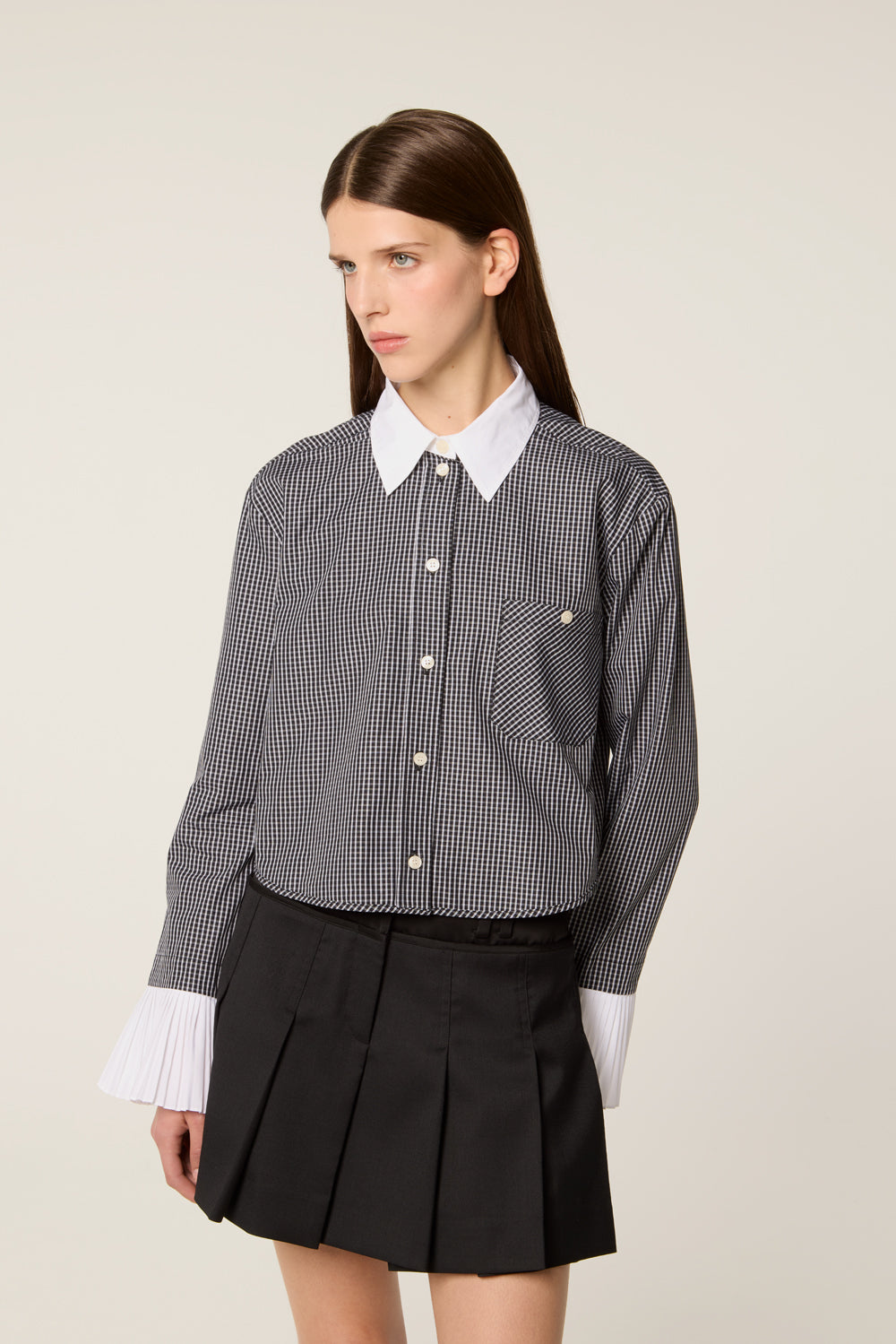 Shirt with pleated cuffs