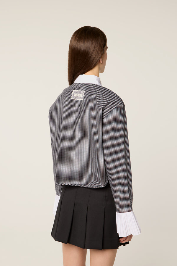 Shirt with pleated cuffs