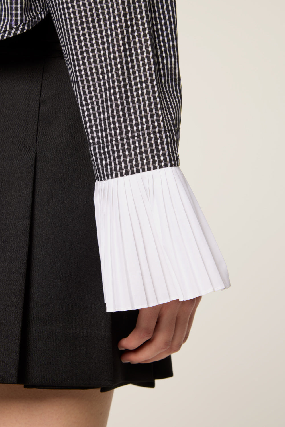 Shirt with pleated cuffs